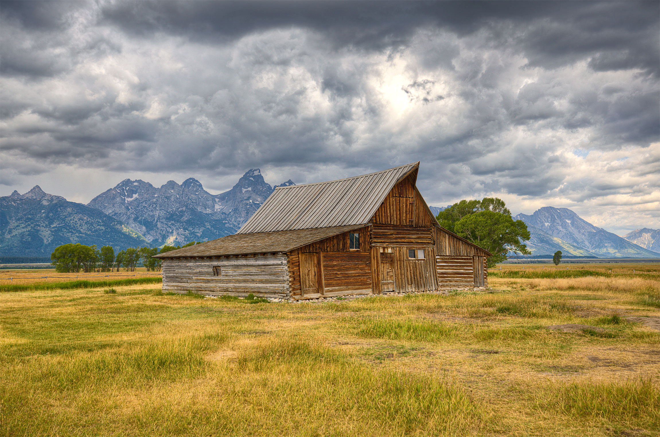 Side View of the T.A. Moulton Barn as a storm rolls in